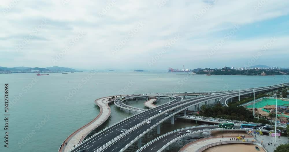 4k,uav shoot landscape of xiamen Fujian china,cars running on sea