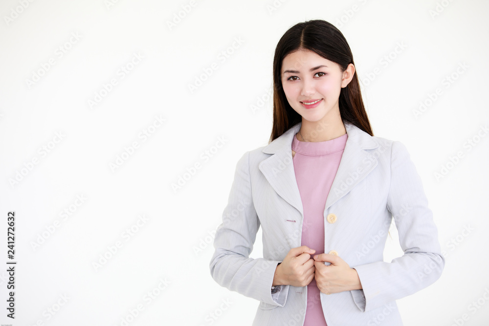 Young beautiful Asian woman with black long hair standing in front of white background Young beautiful Asian woman with black long hair standing in front of white background