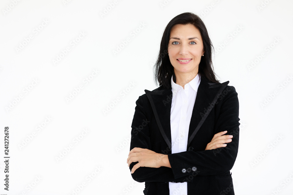 Portrait of beautiful woman in black suit standing in front of white background Portrait of beautiful woman in black suit standing in front of white background