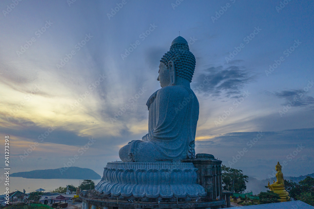 Fototapeta premium aerial photography scenery blue sky and blue ocean behind Phuket white big Buddha. Phuket white big Buddha is the .famous landmark in Phuket island a lot of tourists visiting this landmark every day
