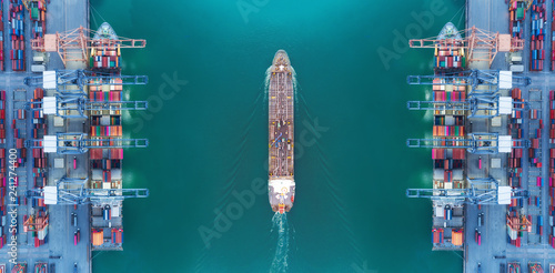 Leinwand Poster Aerial view panoramic oil tanker moving pass sea port warehouse and container ship or crane ship working for delivery containers shipment
