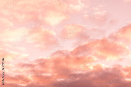 The vivid sky or heaven background of blue, red, crimson and purple clouds of evening sunset or morning daybreak