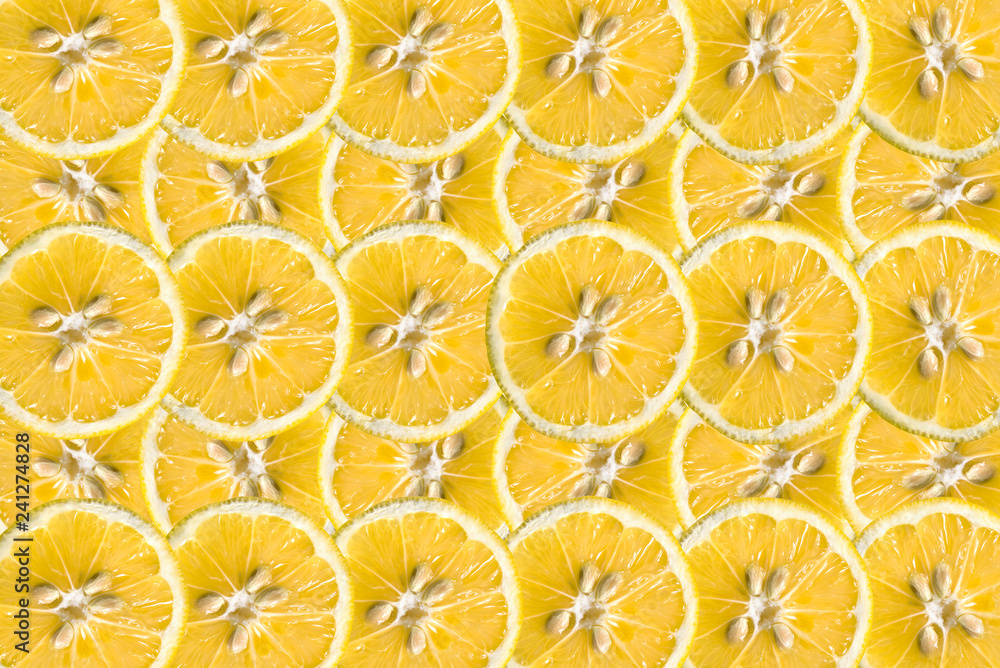 Citrus sliced fruit pattern. Sliced lemons background. Citrus sliced fruit pattern. Sliced lemons background.