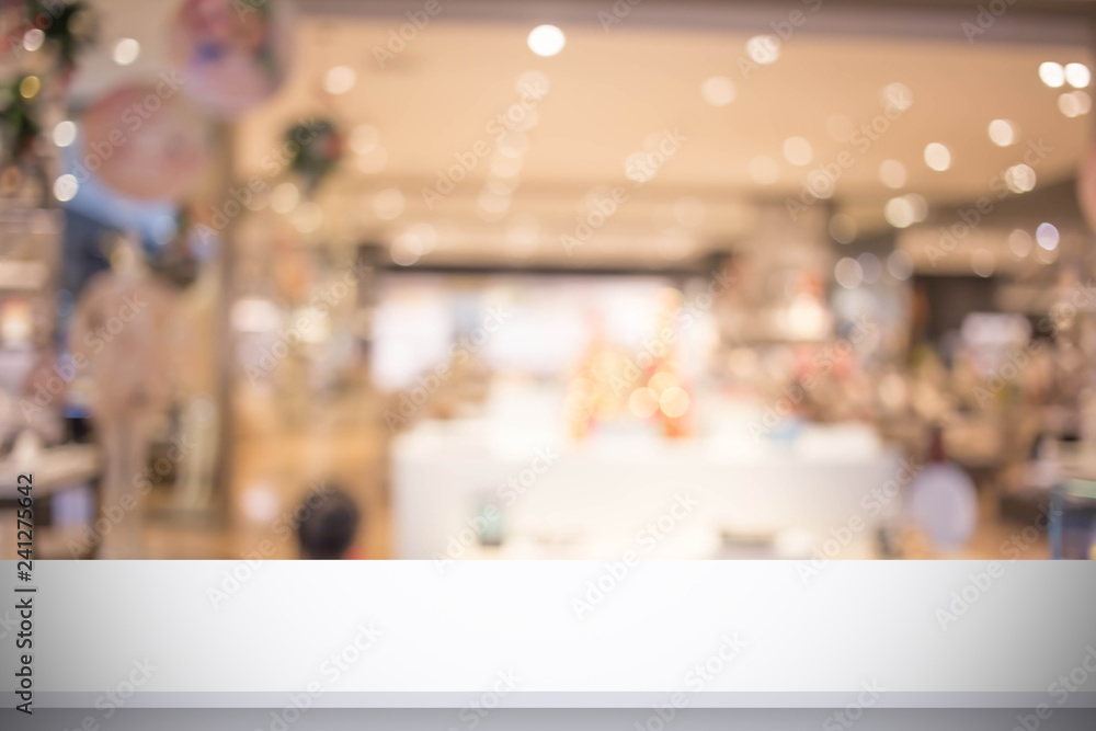 Fototapeta premium Abstract blur image of People walking at shopping mall or exhibition hall with bokeh for background usage .