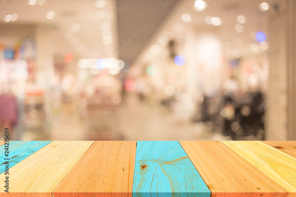 Abstract blur image of People walking at shopping mall or exhibition hall with bokeh for background usage . Abstract blur image of People walking at shopping mall or exhibition hall with bokeh for background usage .