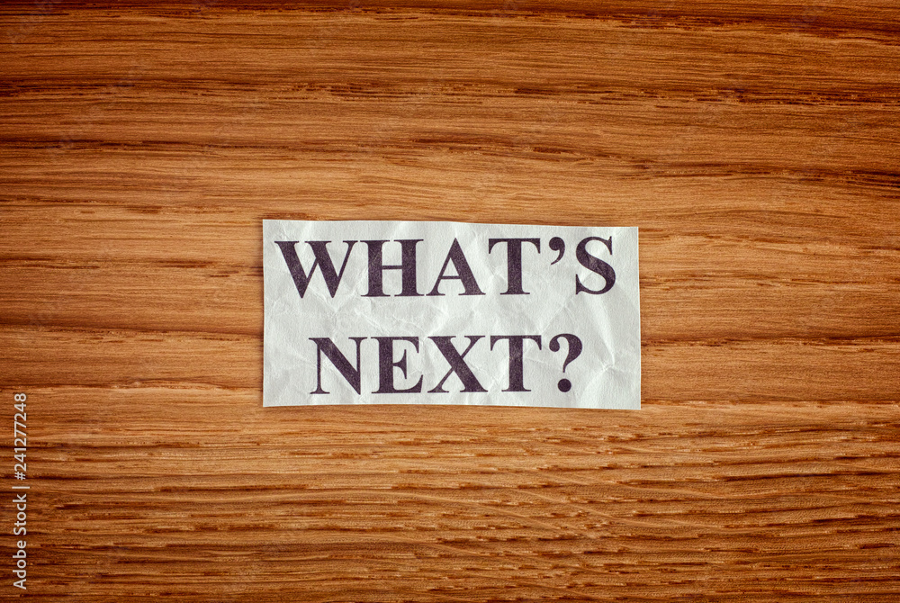 Crumpled paper note with the question What is next? Crumpled paper note with the question What is next?