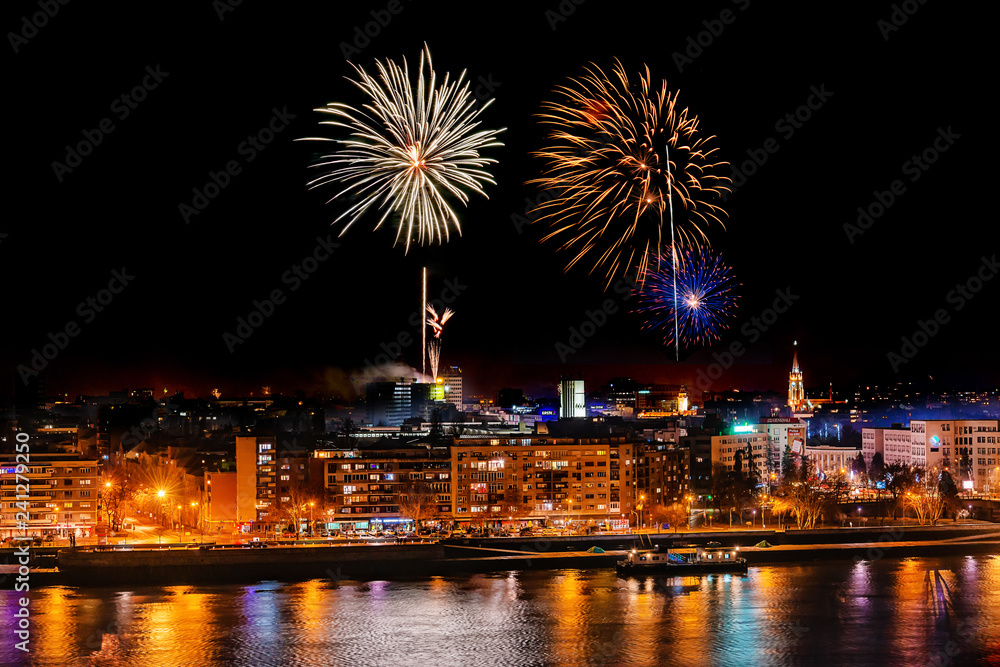 Novi Sad, Serbia - January 01, 2019: Fireworks in Novi Sad, Serbia. New Year's fireworks. Novi Sad, Serbia - January 01, 2019: Fireworks in Novi Sad, Serbia. New Year's fireworks.