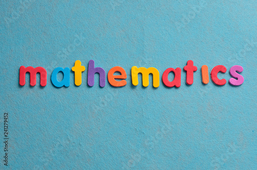 The word mathematics against a blue background