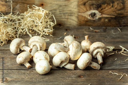 natural, organic mushrooms on a wooden, rustic kitchen table