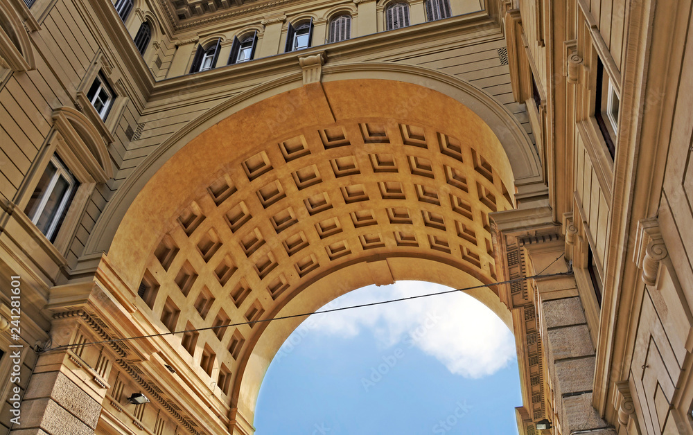 Arcone Triumphal Arch at the Republic Square in Florence, Italy. The Arch was built in 1895. Old city. Tourist attractions. Italian architecture. Landmarks of Italy.