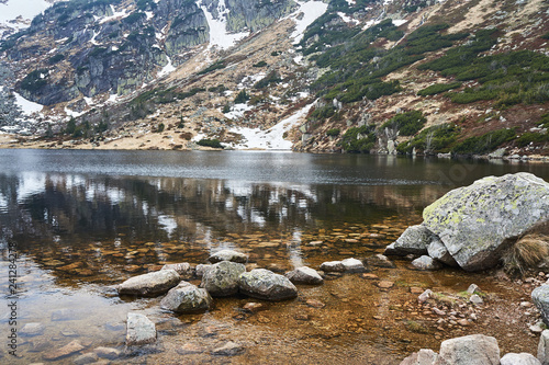 Small Pond in the Giant Mountains in the winter, Poland.. photo