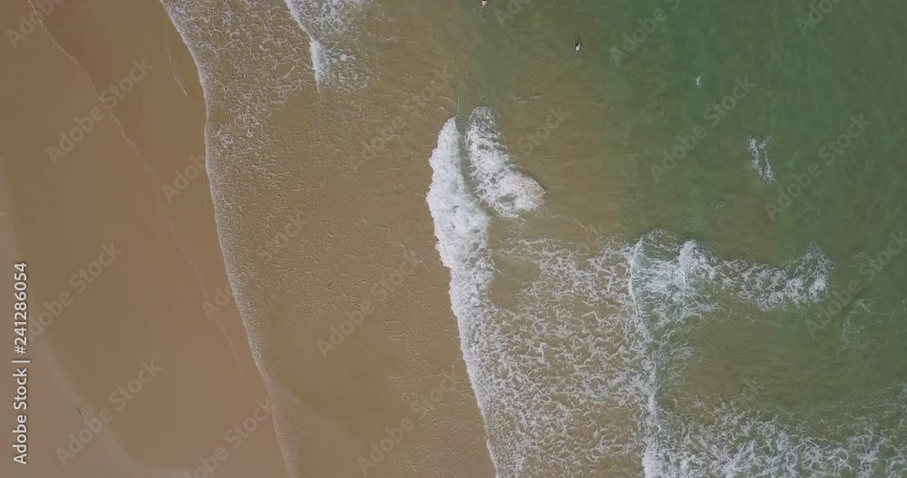 Sea aerial view, top view, amazing nature background. Blue of the water and beautiful sand coasline. Azure beach with turquoise waves and clear water of ocean at sunny day. Sea view from flying drone Sea aerial view, top view, amazing nature background. Blue of the water and beautiful sand coasline. Azure beach with turquoise waves and clear water of ocean at sunny day. Sea view from flying drone