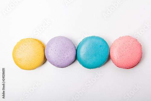 Sweet and colourful macaroons or macaron on white background.
