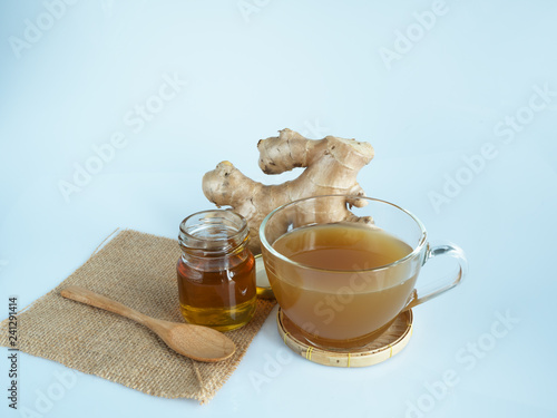 Ginger and honey on white background,