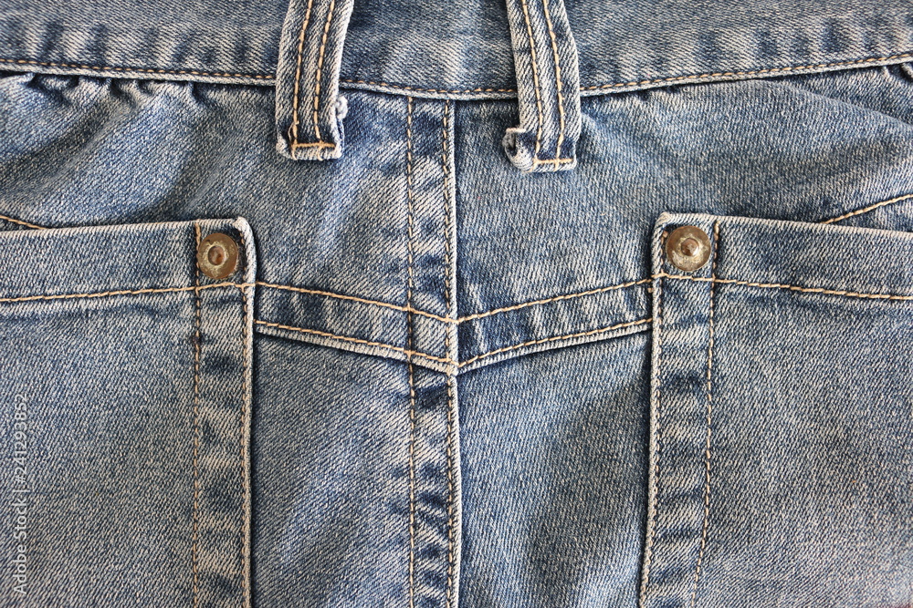 unlock zip on soft blue jean cloth,jean fashion background unlock zip on soft blue jean cloth,jean fashion background