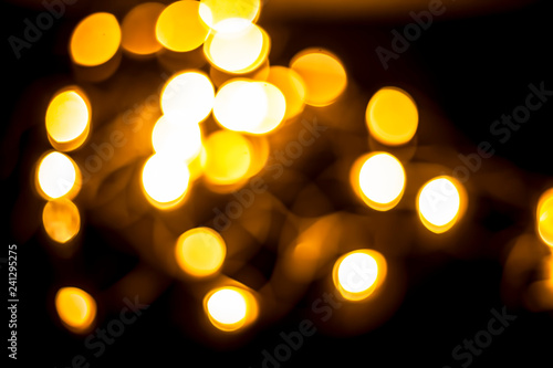 Colorful Christmas lights and blurred background or bookeh of them.