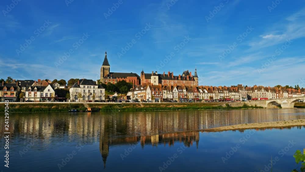 Gien, Loiret, France. The castle and the church overlooking the Loire river. Gien, Loiret, France. The castle and the church overlooking the Loire river.