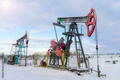 Mining and quarrying. Installations for the extraction of oil from the bowels of the Earth. Pumpjack is the overground drive for a reciprocating piston pump in an oil well. 