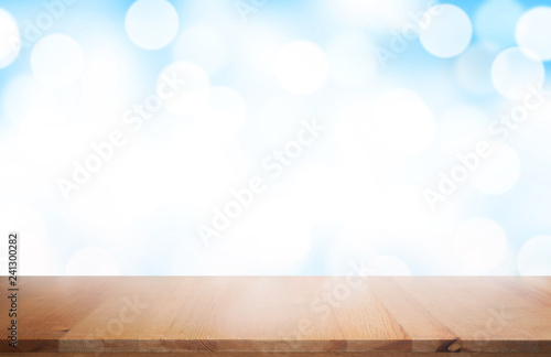 Wooden product display with blue gradient background