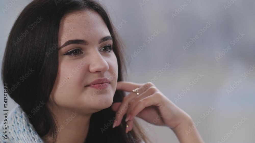 Portrait of a young beautiful girl. The girl smiles and dances Portrait of a young beautiful girl. The girl smiles and dances