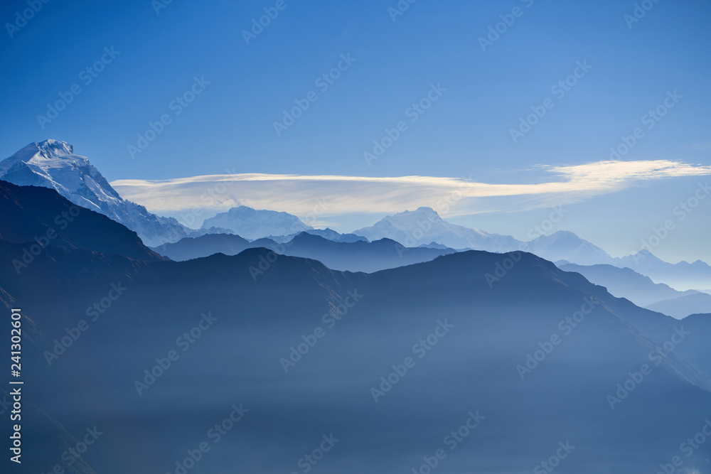 Fog above mountain in valley Himalayas mountains Fog above mountain in valley Himalayas mountains