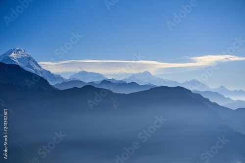 Fog above mountain in valley Himalayas mountains © Raimond Klavins