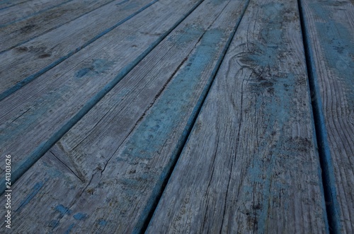 Weathered tabletop, U.K. Wooden outdoor furniture, abstract image.