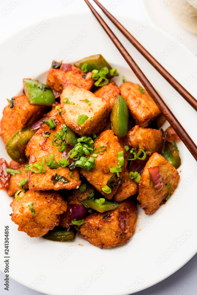 Schezwan Idli or manchurian Idly, tasty indo-chinese recipe. selective focus Schezwan Idli or manchurian Idly, tasty indo-chinese recipe. selective focus