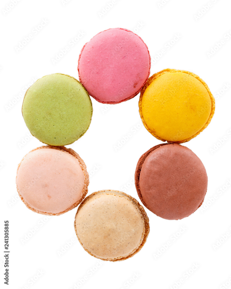 Letter O from multi-colored macaroon cookies. Flat lay, top view, isolated on white. Letter O from multi-colored macaroon cookies. Flat lay, top view, isolated on white.