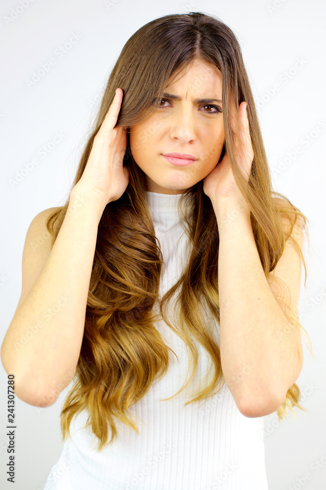 Fototapeta premium Young woman feeling very strong headache in winter
