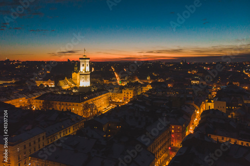 aerial view of sunset over old european town. winter time