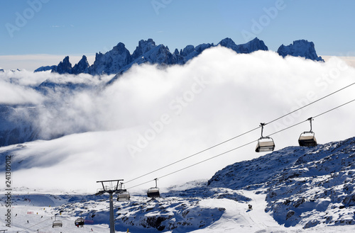 Panoramically view from ski slope over Dolomite mountains in Tre Valli, Italy. - Image