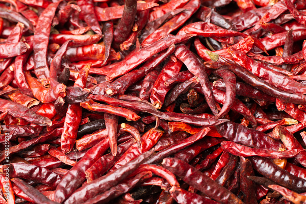 Dried red chilli or chilli cayenne peppers on vintage background tone