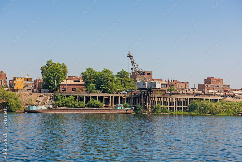 Landscape view of large waterfront industrial area on river nile in Egypt