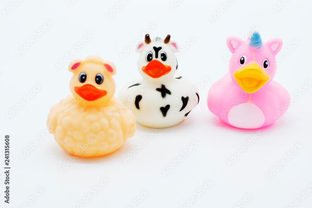 Three rubber ducks isolated on a white background Three rubber ducks isolated on a white background