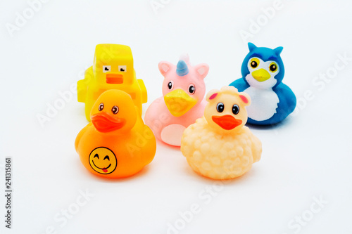 A group of rubber ducks on an isolated background