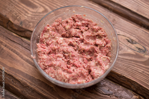 Fresh minced meat with bread for making meatballs.