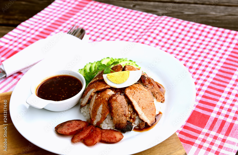 Barbecued red pork in sauce with rice..Thai Pork Menu. Barbecued red pork in sauce with rice..Thai Pork Menu.