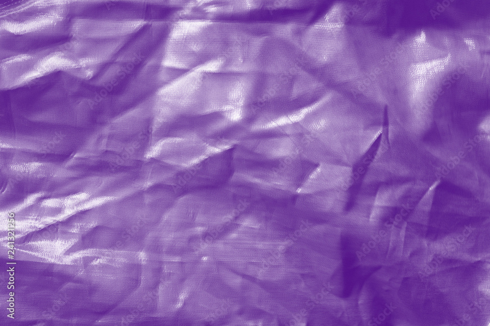 Obraz premium Elegant violet textile background. Silk cloth texture. Fabric pattern.