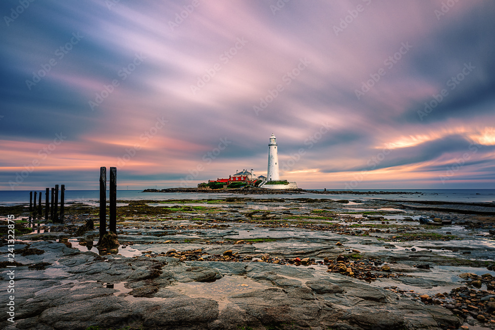 Amazing sunset at St. Mary's Lighthouse. Whitley Bay, North Tyneside. Northumberland, England. Great Britain. Long exposure