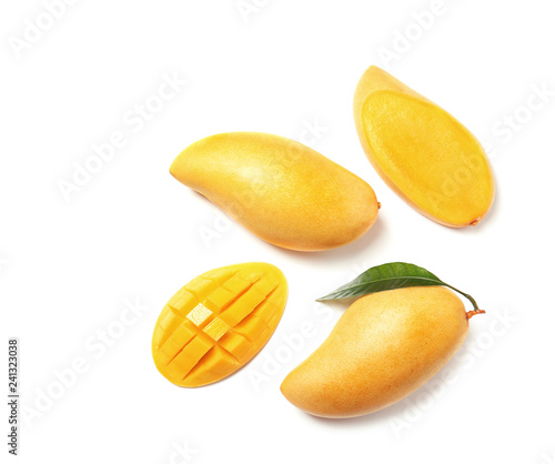 Composition with fresh mango fruits on white background, top view
