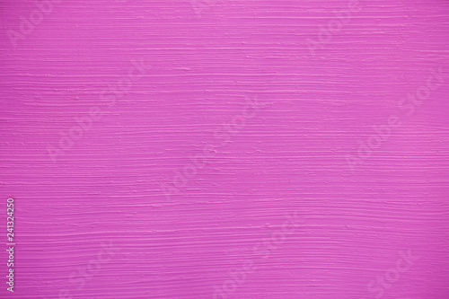 Striped pattern on a pink wall
