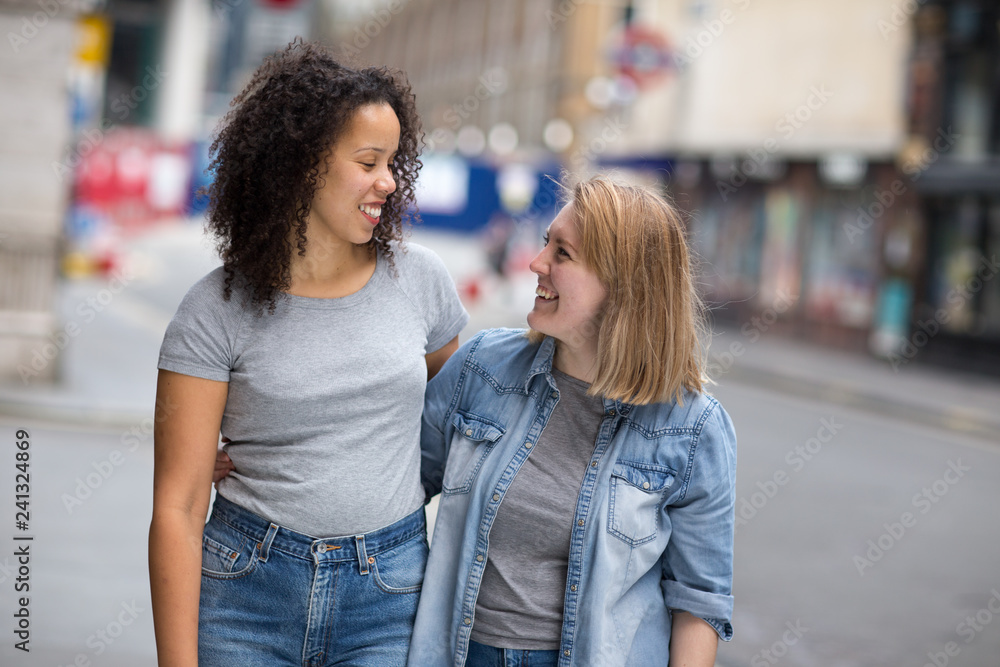 Fototapeta premium happy lesbian couple in the street