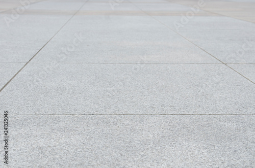 Gray granite paving slab © andyborodaty