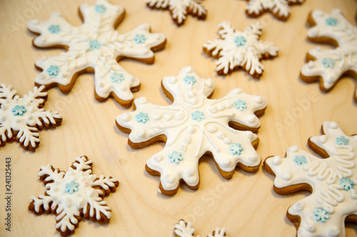 Cookies with icing. Christmas cookies in the shape of snowflakes.