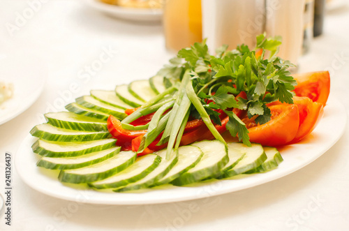 Wallpaper Mural Cucumber, sensible tomatoes and fresh lettuce. Light evening dinner vegetarian. Torontodigital.ca