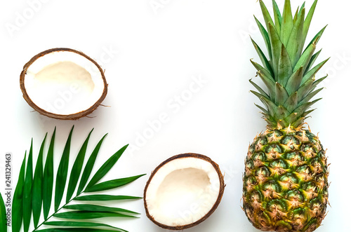 Tropical background with pineapple and coconut  on isolated white background.