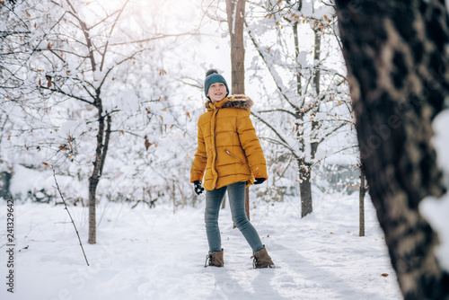 Girl walking on a fresh snow