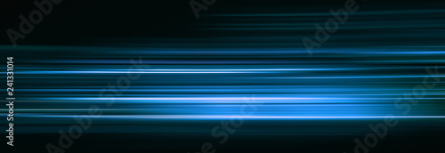 Fotografie, Obraz Abstract blue light trails in the dark, motion blur effect