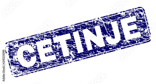 CETINJE stamp seal print with grunge style. Seal shape is a rounded rectangle with frame. Blue vector rubber print of CETINJE caption with unclean style.